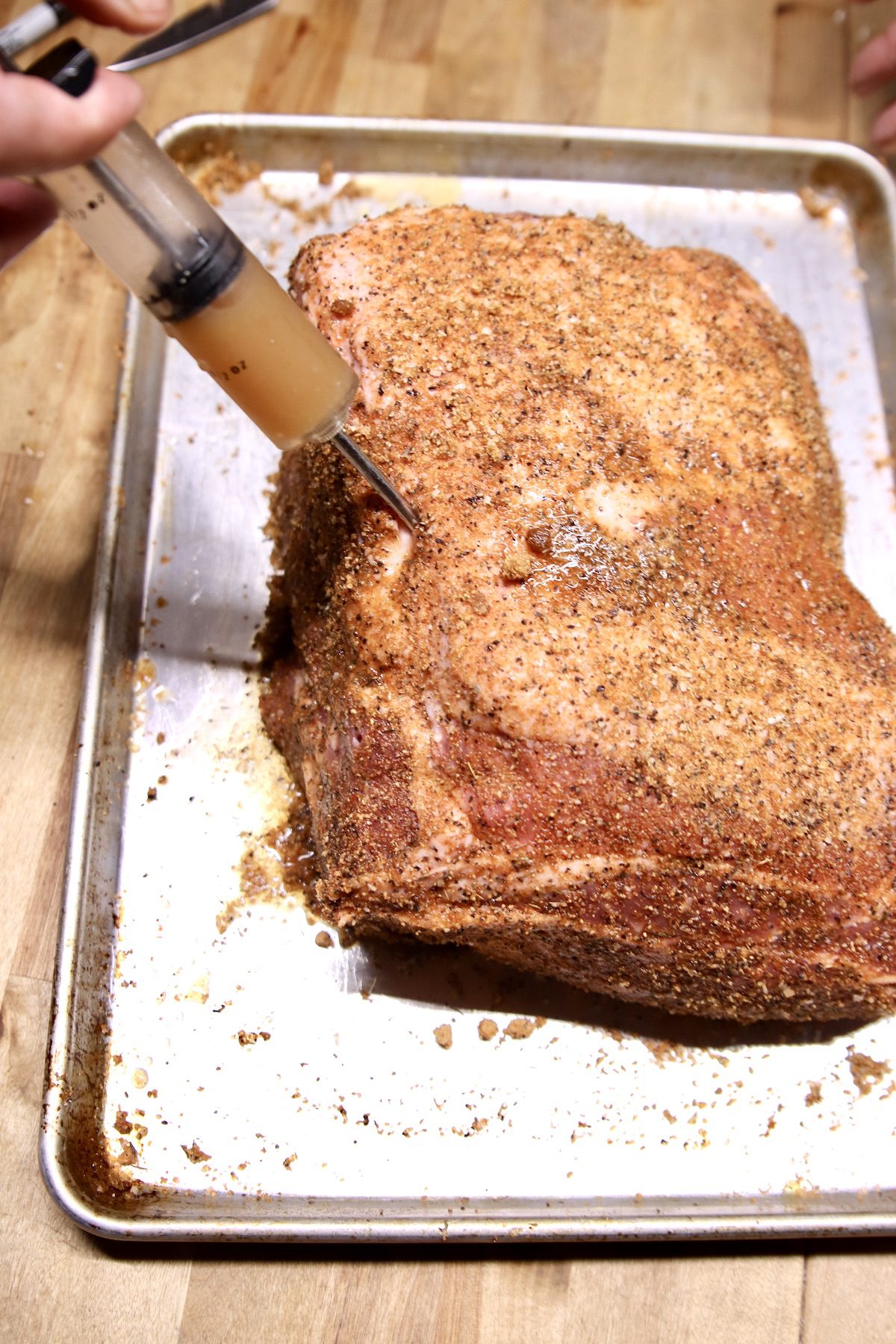 Injecting Pork Shoulder With a Meat Injector