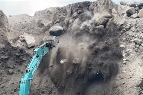 Mining sand on rocky cliffs